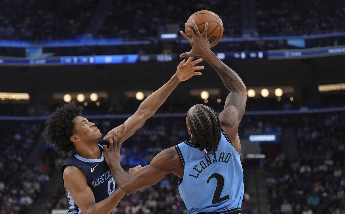 九游娱乐入口-热火队客场险胜灰熊队，取得两连胜